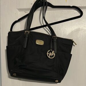 Michael Kors Black Shoulder Bag with Structured Design and Metallic Accents